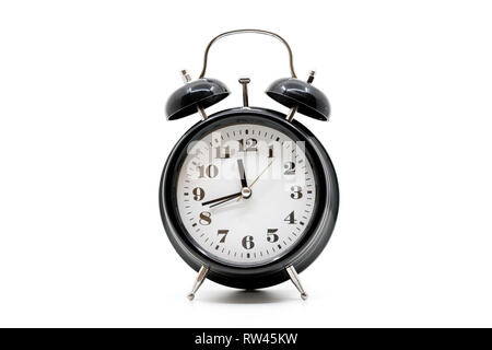 Black alarm clock on white background Stock Photo