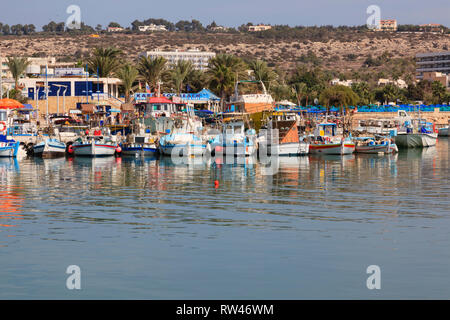 Traditional Cypriot fishing boats moored in Ayia Napa harbour, Cyprus. 2010 Stock Photo
