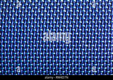 Blue symmetrical texture of synthetic fiber. Stock Photo