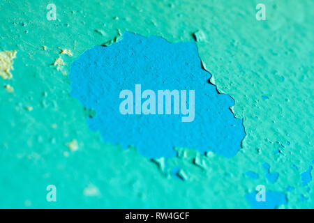 Peeling Blue Aquamarine Color Paint from the Wall. Shattered Plaster Background Stock Photo
