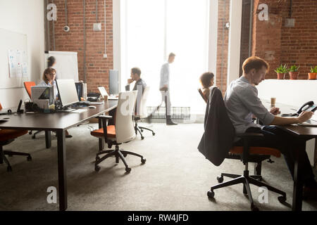 Busy staff employees group working on computers in office rush Stock Photo