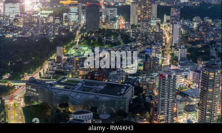 Tokyo - August 08, 2017 : Tokyo skyline night aerial view and route 319 car trails, Nogizaka Tunnel, Aoyama Cemetery and The National Art Center from  Stock Photo
