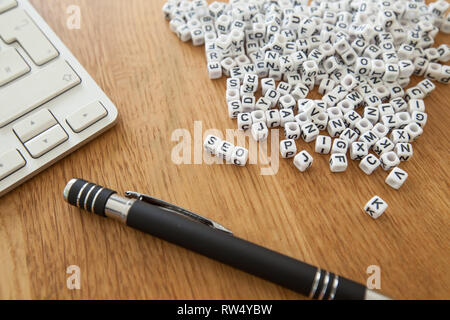 Trust word written on cube shape white blocks on wooden Business table Stock Photo
