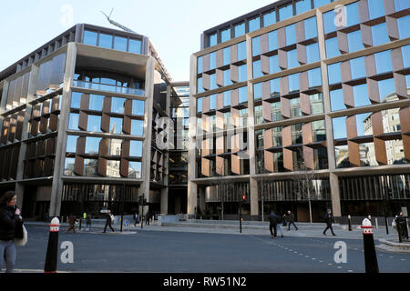 Exterior view pedestrians walking outside the Bloomberg Building HQ offices on Queen Victoria Street in the City of London England UK    KATHY DEWITT Stock Photo