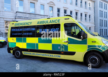 Side on view of Blue Light Services Emergency Ambulance parked outside Barts NHS Hospital in the City of London England UK  KATHY DEWITT Stock Photo