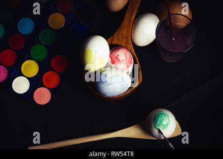 Crop hand painting Easter egg Stock Photo