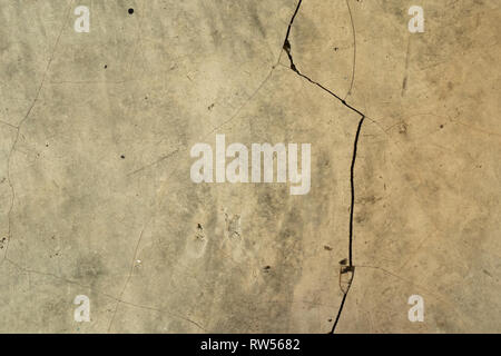 natural white marble for pattern and background. Background beige floor cracked. Stock Photo