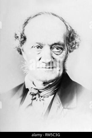 Sir Richard Owen KCB FRS (1804-1892) in an 1860s portrait by Elliott & Fry. Owen was an English biologist, comparative anatomist, and paleontologist who coined the term dinosauria, from which we derive the word dinosaur. He was also an outspoken critic of Charles Darwin's theory of evolution by natural selection. Stock Photo