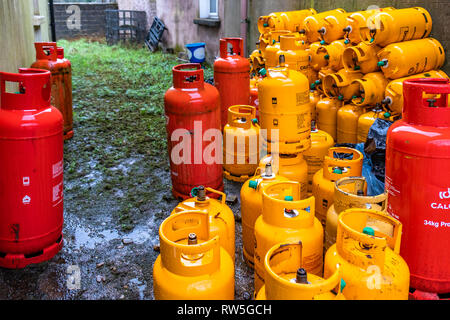 PETTIGO / IRELAND - MARCH 03 2019 : Rows of LPG Gas bottles stored behind the house Stock Photo