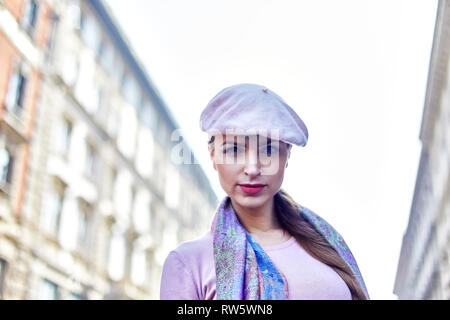 Portrait of a women during the day  in public boulevard somewhere in Milano Italy Europe Stock Photo