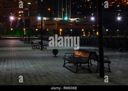 Night view of Baku with the Flame Towers skyscrapers, television tower and the seaside of the Caspian sea, Baku, Azerbaijan. Stock Photo