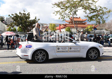 LOS ANGELES - FEBRUARY 9, 2019: Tai Vong and Charlie Sampson CHP Captains ride in the Los Angeles Chinese New Year Parade. Stock Photo