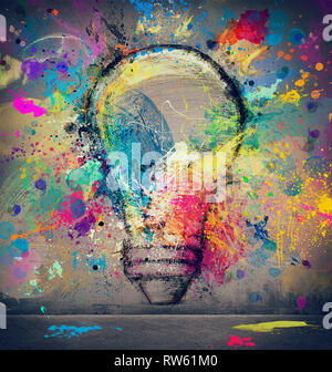 Drawing on a wall of a big light bulb. Concept of innovation and creativity Stock Photo