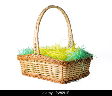 Wicker woven Easter basket isolated on white Stock Photo