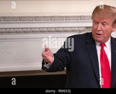 Washington, United States Of America. 04th Mar, 2019. United States President Donald J. Trump makes remarks at the National Association of Attorneys General in the State Dining Room of the White House in Washington, DC on Monday, March 4, 2019. Credit: Ron Sachs/CNP | usage worldwide Credit: dpa/Alamy Live News