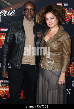 HOLLYWOOD, LOS ANGELES, CA, USA - MARCH 04: Actor Don Cheadle and partner Bridgid Coulter arrive at the World Premiere Of Marvel Studios 'Captain Marvel' held at the El Capitan Theatre on March 4, 2019 in Hollywood, Los Angeles, California, United States. (Photo by Xavier Collin/Image Press Agency) Stock Photo