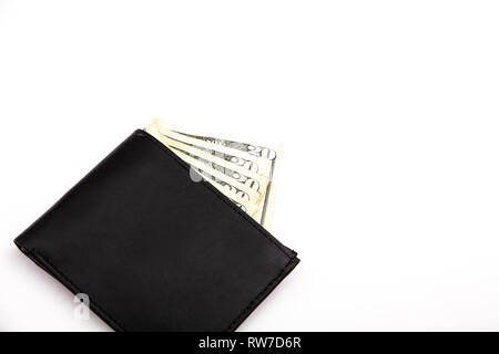 A black leather wallet on white showing five twenty dollar bills Stock Photo