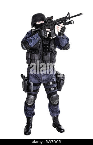 Special weapons and tactics SWAT team officer with his gun. Stock Photo