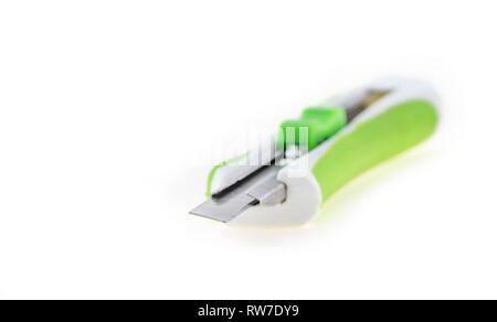 box cutter green colored detail isolated on white Stock Photo