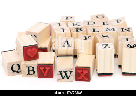 Close up of type set rubber stamps with wooden handle. the alphabet Stock Photo