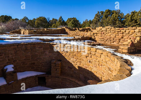 Ancient Kiva found in Mesa Verde National Park with some snow on the ground. Kivas had many uses varying from ceremonial to social or utilitarian purp Stock Photo