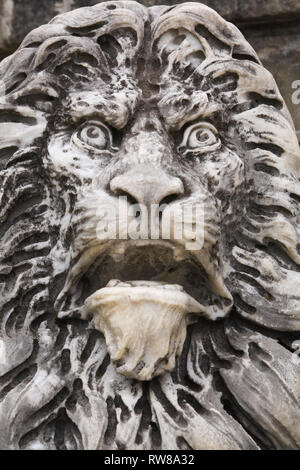 Close-up of the heraldic lion marble sculpture in front of the Peles Castle in autumn, Sinaia, Romania, Eastern Europe Stock Photo