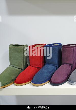Colorful warm, fuzzy sheepskin Australian winter boots Stock Photo