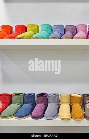 Colorful warm, fuzzy sheepskin Australian winter boots Stock Photo