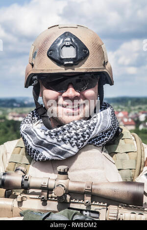 Member of Navy SEAL Team with weapons in action. Stock Photo