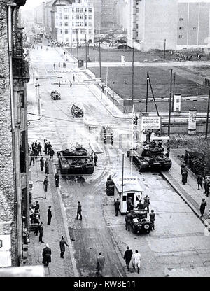 Berlin, October 1961. - Beginning August 23, when the East German police closed all but seven of the crossing points between the two parts of this city and limited access for allied personnel to Friedrich Strasse, the Communists attempted to limit the entry of Americans into the Soviet Sector. This campaign reached a climax in late October, when the 'People's Police' insisted upon identification of persons entering East Berlin in official American cars. The Americans, under instructions from their government, refused to identify themselves.  As a demonstration of the right of access to East Be Stock Photo