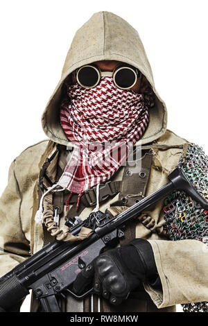 Studio shot of a nuclear post apocalypse survivor in tatters. Stock Photo