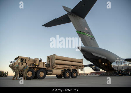 A U.S. Army Terminal High Altitude Area Defense launching station prepares to load onto a 4th Airlift Squadron C-17 Globemaster III at Fort Bliss, Texas, Feb. 23, 2019. The THAAD missile system is a land-based platform capable of intercepting ballistic missiles both inside and just outside the atmosphere. (U.S. Air Force photo by Staff Sgt. Cory D. Payne) Stock Photo