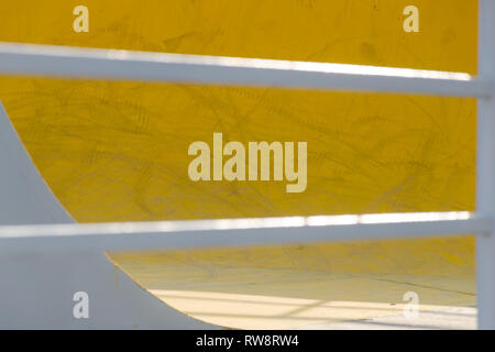 Wall with geometric elements. Mix yellow and grey,  geometric background, abstract colorful backdrop, minimal design Stock Photo