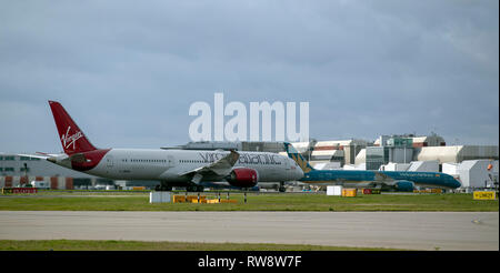 A Virgin Atlantic Boeing 787 Dreamliner plane taxis to the southern runway at Heathrow Airport in West London Stock Photo