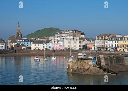 Ilfracombe, England - February 27, 2019: Private yachts and a fishing boat moored in the inner harbor in winter Stock Photo