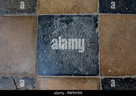 texture old cracked tiles black and clay colored Stock Photo