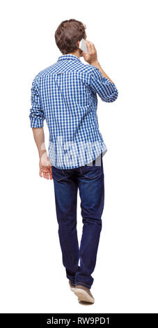 Man Using Mobile Back View backview of man walking with a mobile phone. backside view of person ...