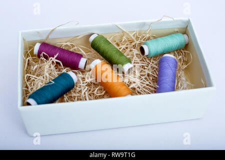 Picture of thread in the box. Isolated on the white background. Stock Photo