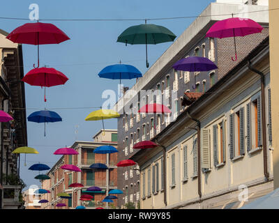 Villasanta, Monza, Brianza, Lombardy, Italy: hanged colorful umbrellas along the main street Stock Photo