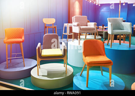 Chairs in the salon of furniture Stock Photo