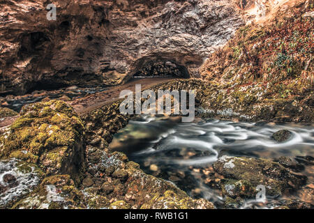 small natural bridge in Rakov Škocjan Stock Photo