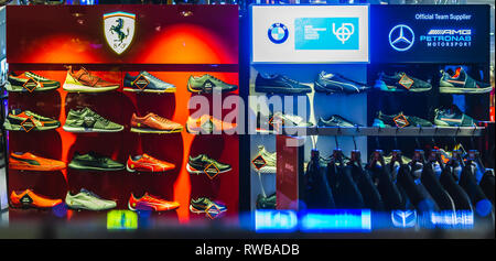 Bangkok, Thailand - February 28, 2019: Puma Ferrari, BMW and AMG Motorsport Shoes display at Puma Footwear Store in the Iconsiam Bangkok Thailand. Stock Photo