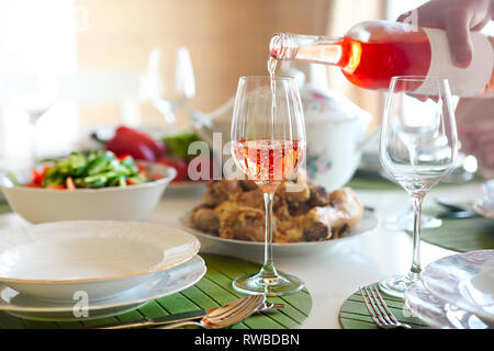 Friends clinking glasses with rose wine at Christmas, square crop stock  photo (222245) - YouWorkForThem