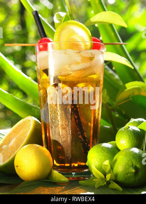 Long Island Iced Tea Cocktail on tropical Background Stock Photo