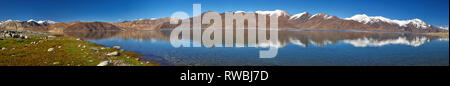 Mirror reflection of mountains on the surface of the water of Pangong Lake, photo panorama, Jammu and Kashmir state, India. Stock Photo