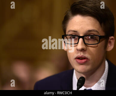 Washington, District of Columbia, USA. 5th Mar, 2019. Ethan Lindenberger, an 18 year-old student from Norwalk High School, Norwalk, Ohio, who questioned his parents' anti-vaccine stances and eventually got himself inoculated, testifies during the United States Senate Committee on Health, Education, Labor and Pensions Committee hearing on ''Vaccines Save Lives: What Is Driving Preventable Disease Outbreaks?'' on Capitol Hill in Washington, DC on Tuesday, March 5, 2018 Credit: Ron Sachs/CNP/ZUMA Wire/Alamy Live News Stock Photo