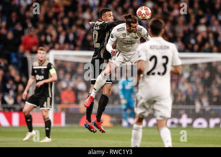 Santiago Bernabeu, Madrid, Spain. 5th Mar, 2019. UEFA Champions League football, round of 16, second leg, Real Madrid versus Ajax; Gareth Bale (Real Madrid) wins the header from Noussair Mazraoui (Ajax) Credit: Action Plus Sports/Alamy Live News Stock Photo