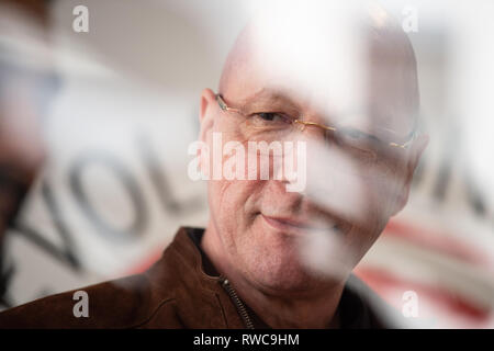 06 March 2019, Baden-Wuerttemberg, Pforzheim: Uwe Hück, ex-Porsche-Chairman of the Works Council, is standing at the opening of the 'Revolutionary Election Office'. Hück will run for the Pforzheim SPD as the top candidate for the local elections on 26 May. Photo: Fabian Sommer/dpa Stock Photo