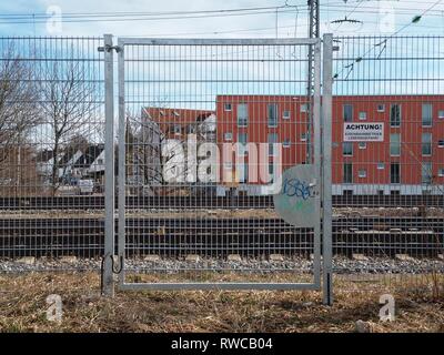 Munich, Bavaria, Germany. 6th Mar, 2019. A fence around the SBahn train tracks in Munich designed to prevrnt delays caused by people on the tracks. Credit: Sachelle Babbar/ZUMA Wire/Alamy Live News Stock Photo