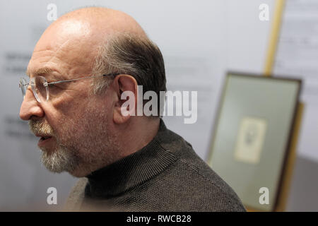 March 6, 2019 - Kiev, Ukraine - Art historian EDUARD DIMSHITZ speaks to media, during presentation the painting of self-portrait by Russian artist Kazimir Malevich, at the opening of the exhibition ''Avant-garde. In search of the fourth dimension'' in the center of modern art ''M17'' in Kiev, Ukraine, on 06 March 2019. According to representatives the M17, for the first time in Ukraine presented a previously unseen self-portrait by Russian artist Kazimir Malevich, which he painted 11 months before his death. ''Now i look like Marx in a grave. When I go out, the children shout Karl Marx,'' sign Stock Photo